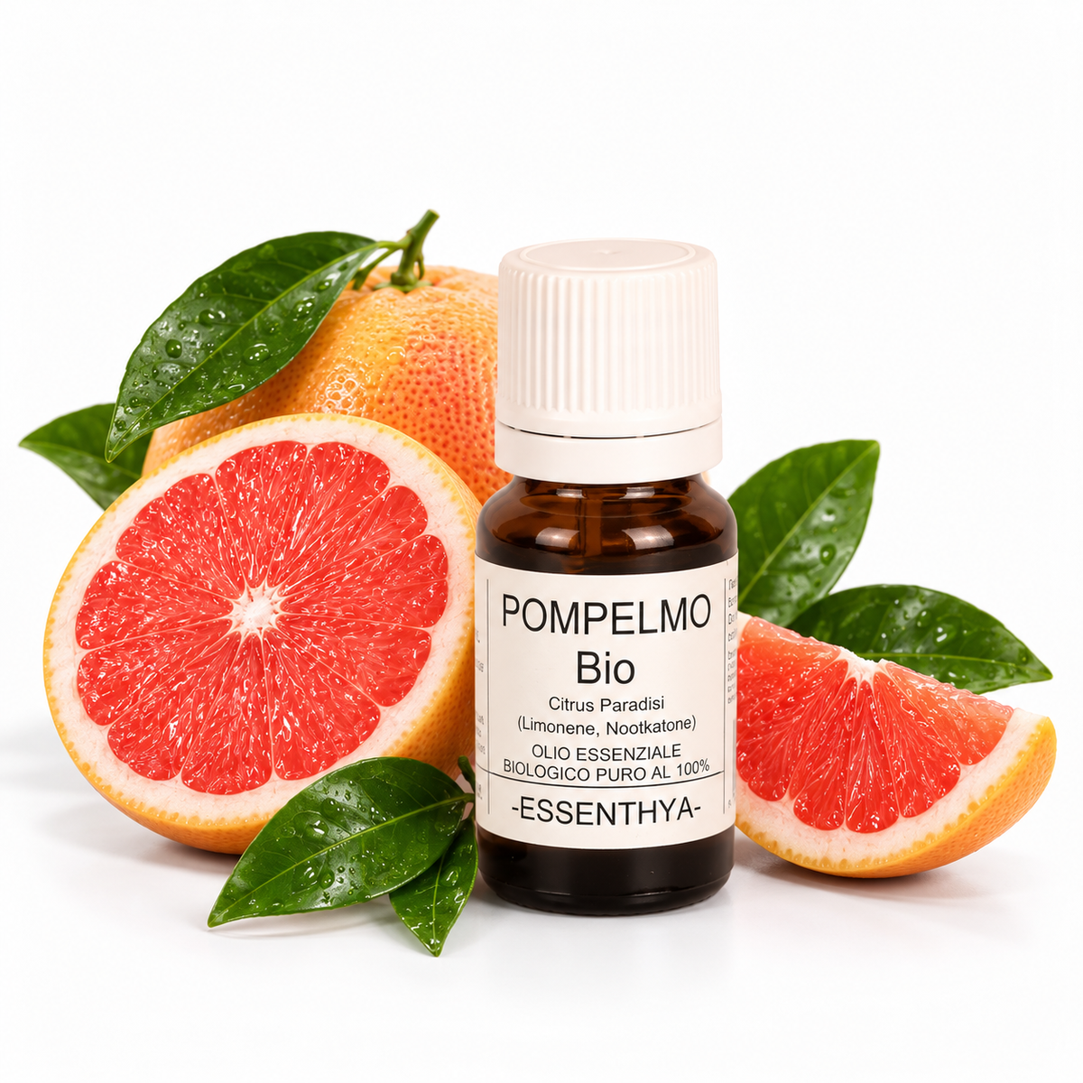 Flacone di olio essenziale di Pompelmo Bio in vetro ambrato, con pompelmo rosa tagliato a metà e foglie su fondo bianco — Citrus paradisi