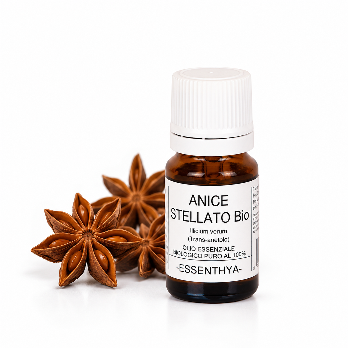 Flacone di olio essenziale di Anice Stellato Bio da 10 ml accanto ai frutti stellati — Illicium verum