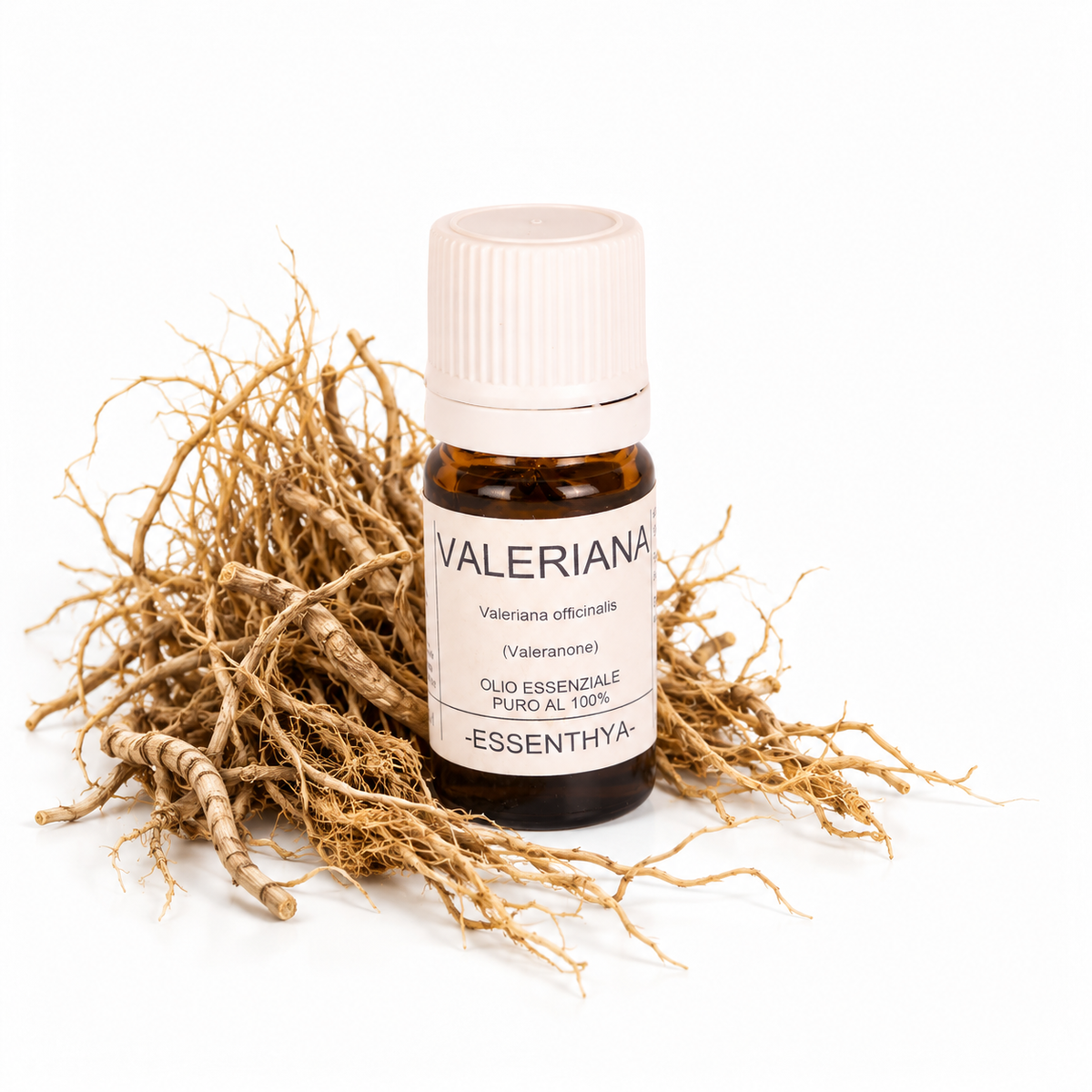 Flacone di olio essenziale di Valeriana in vetro ambrato, con radici di valeriana su fondo bianco — Valeriana officinalis